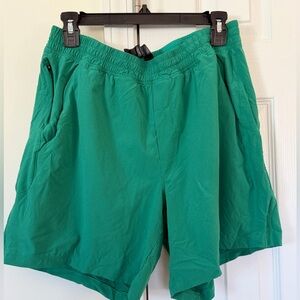 Lululemon Men's Pace Breaker Linerless Shorts in a green color